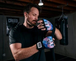 TITLE Boxing Defender Sublimated Glove Wraps 39 TITLE Boxing Defender Sublimated Glove Wraps -Boxing Shop KSGWBKGX 1